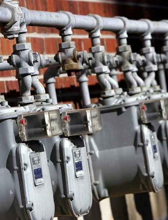 Gas meters mounted on a multi-unit building